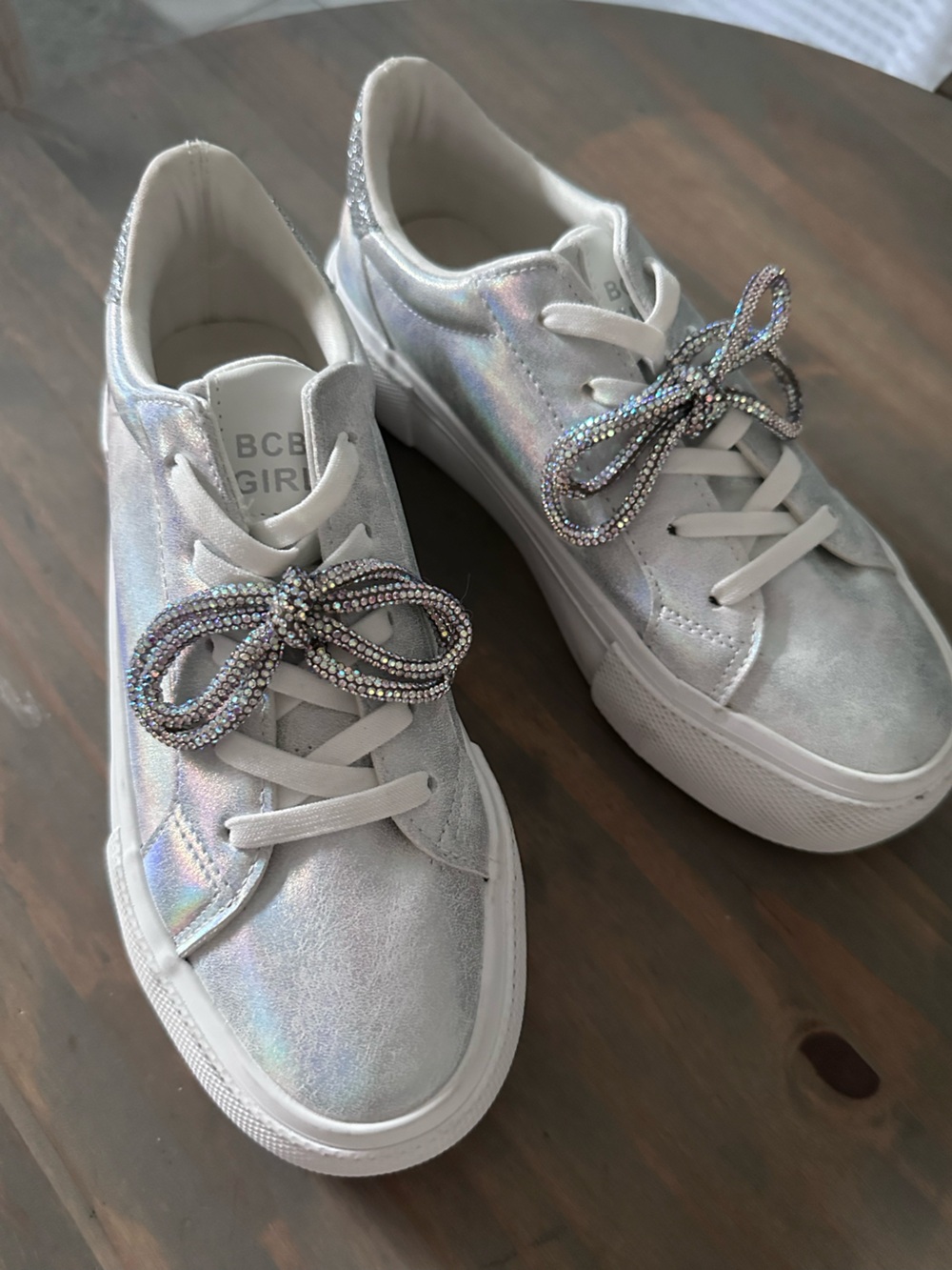 BCBGirls Iridescent Silver Kids Sneakers with Crystal Bow Accent. New never worn